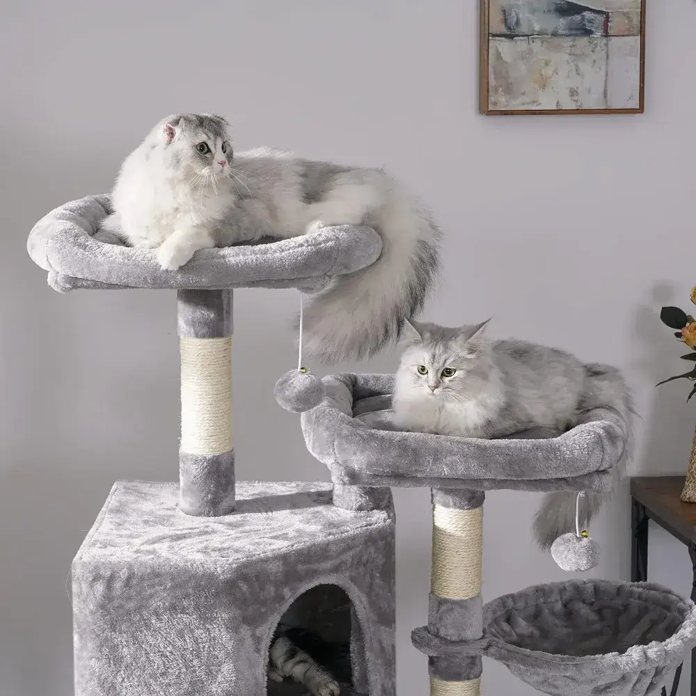 A multi-level cat condo room with toys