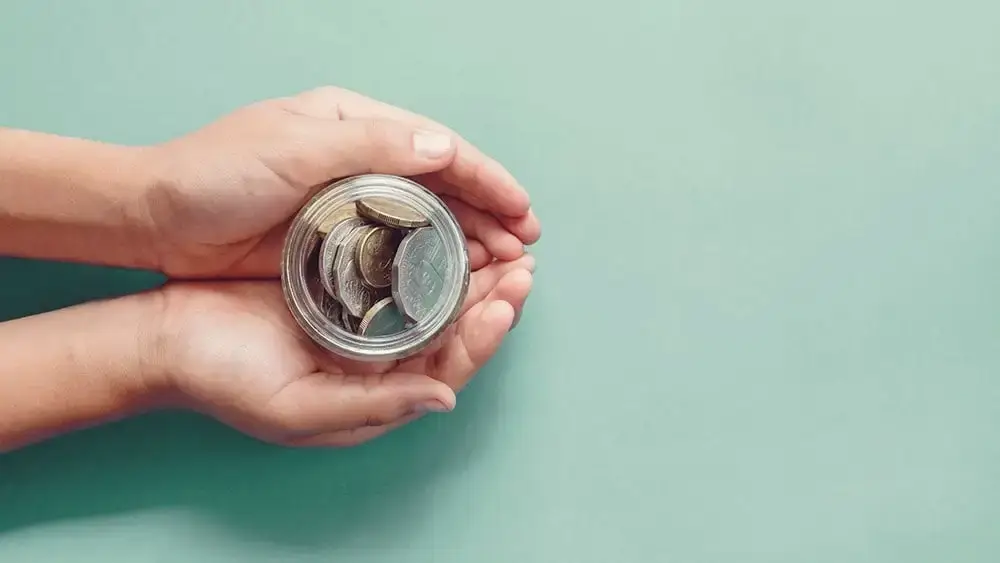 Donation jar with money for animals