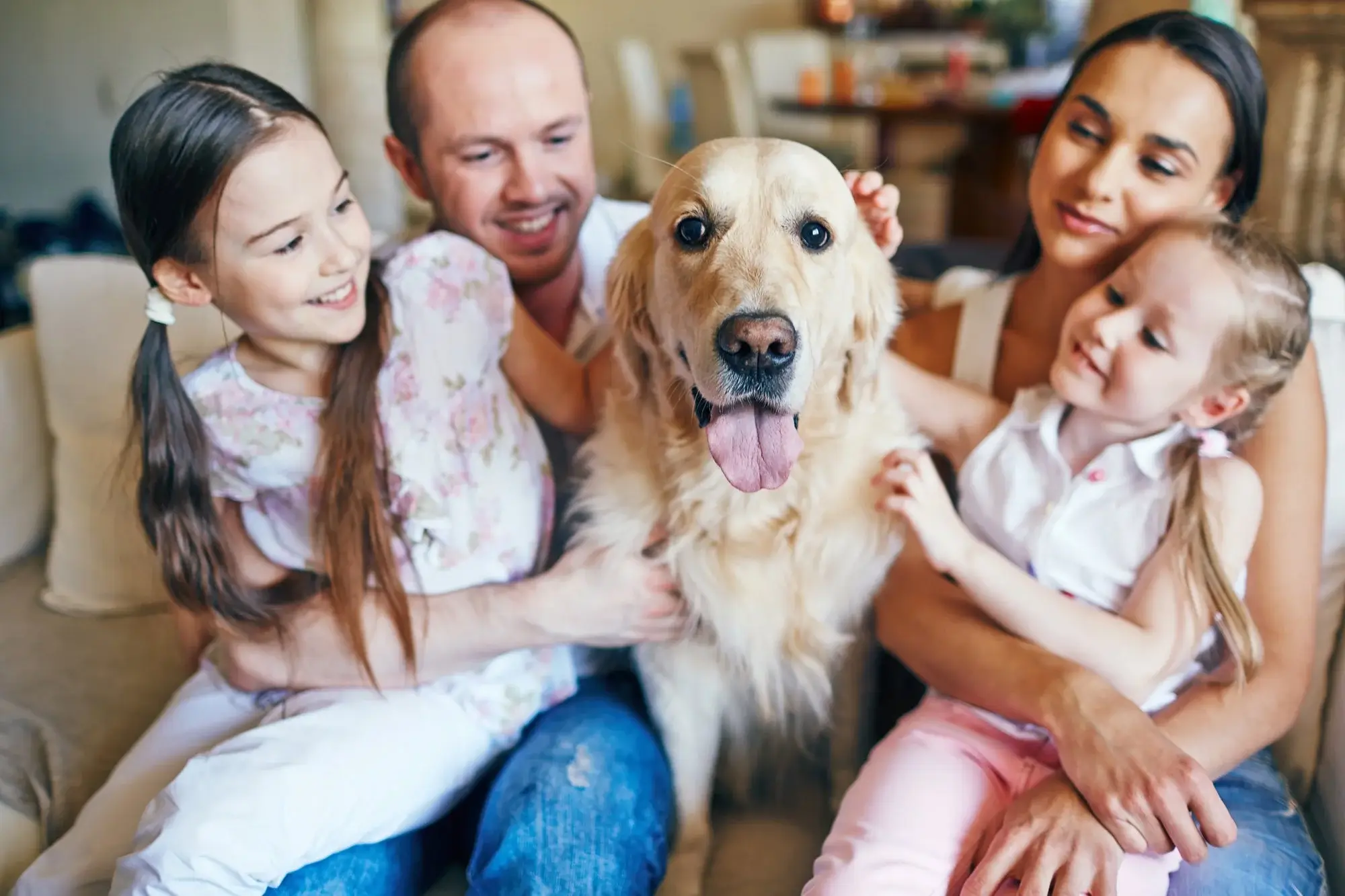 A happy family adopting a new dog